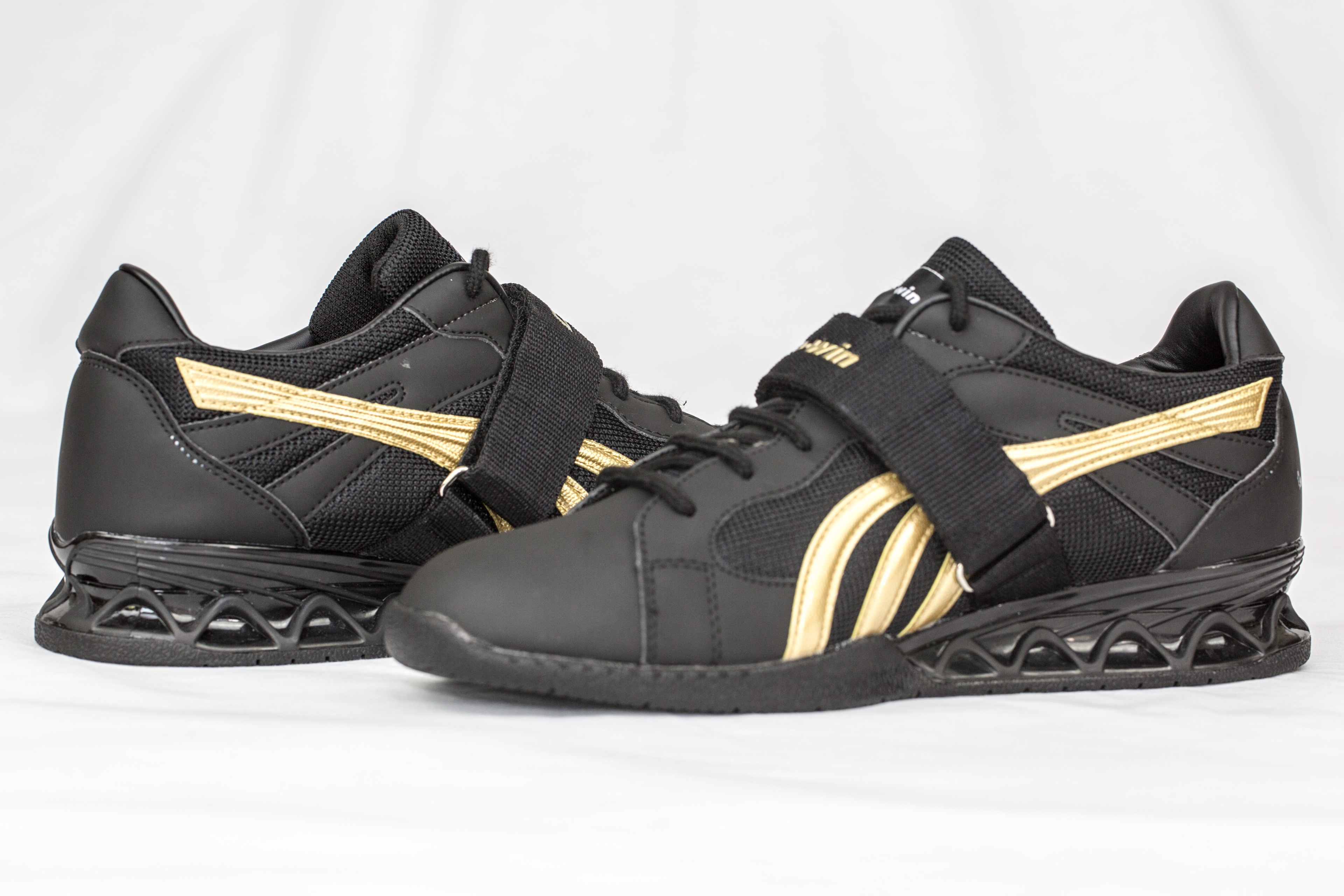 black and gold weightlifting shoes